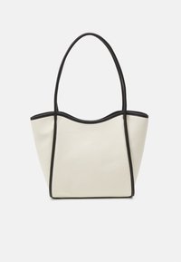 Torba na zakupy z płótna w kolorze off-white z czarnymi wykończeniami, z zaokrąglonym górnym brzegiem i dwoma długimi rączkami, ułatwiającymi noszenie.