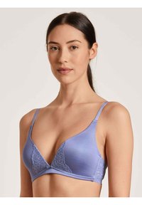 Light purple triangular bra featuring lace accents on the cups and smooth fabric. Adjustable straps and a simple hook closure.