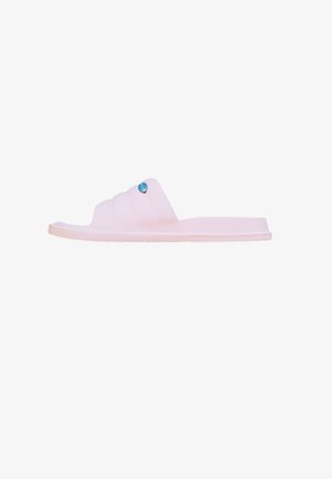 Pink rubber slide sandal with a textured strap featuring three vertical ridges and a blue circular accent on the side. Flat sole.