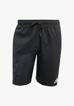 Black athletic shorts made from synthetic material, featuring an elastic waistband with a drawstring and a white logo on the lower left leg.
