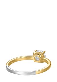 Gold and silver ring featuring a round stone, smooth band design, with a partial gold overlay and a polished finish.