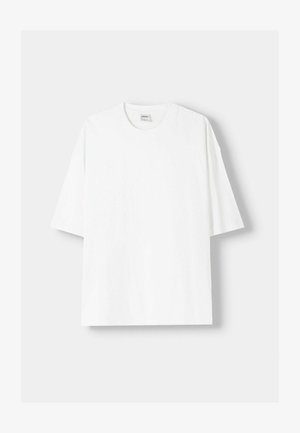 Weißes kurzärmliges T-Shirt aus Baumwolle mit Rundhalsausschnitt und lockerer Passform. Glatte Textur, ohne sichtbare Muster oder Akzente.