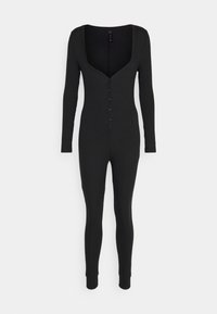 Bodysuit noir à manches longues côtelé avec un décolleté en V profond, une rangée unique de boutons sur le devant et des poignets moulants aux chevilles.