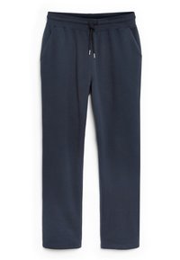 Pantalones de chándal azul marino hechos de una tela suave, con una cintura con cordón, dos bolsillos laterales y puños elásticos en los tobillos.