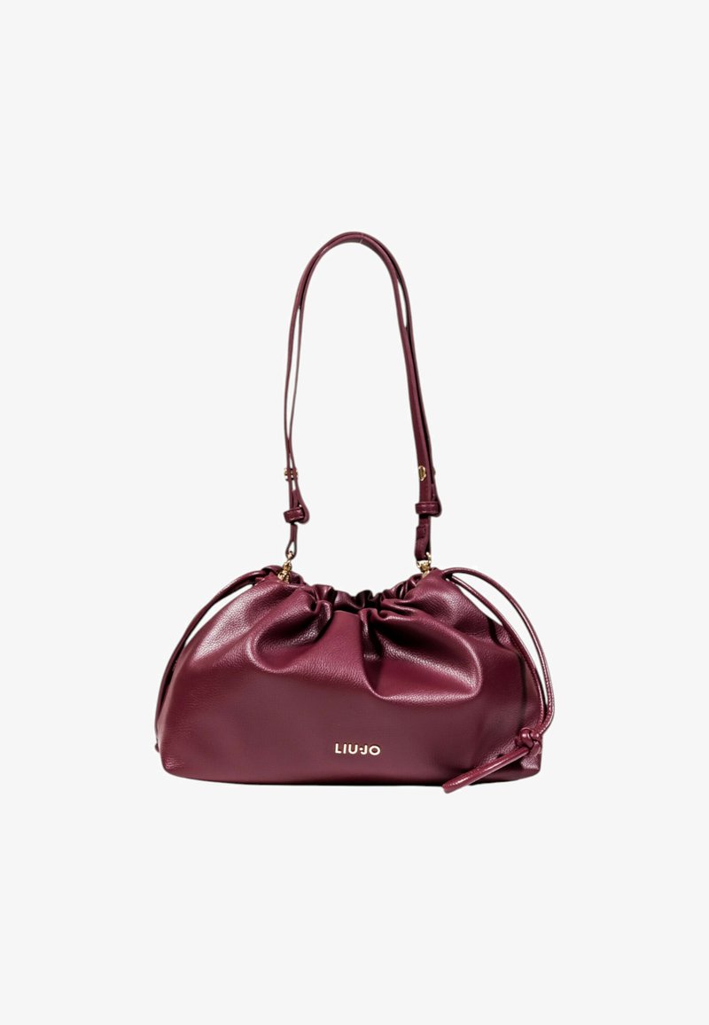 Bordeaux læder håndtaske med en samlet design, der har en justerbar skulderrem og en guld-tone logo detalje.