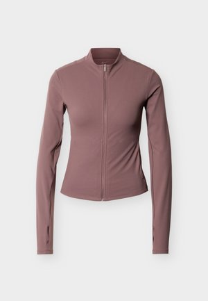 Chaqueta de manga larga con cremallera en color malva. Hecha de tejido liso y elástico, con una silueta ajustada y ojales para el pulgar en los puños.