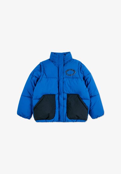 Blue puffer jacket featuring a high collar, black side pockets, and an embroidered logo on the chest. Smooth texture with a quilted design.