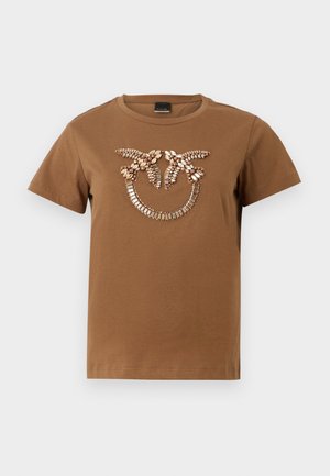 Brun bomulds T-shirt med et dekorativt design af perler og sten på forsiden. Rund halsudskæring og korte ærmer med en afslappet pasform.