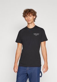 Tommy Jeans - SLIM ESSENTIAL GRAPHIC TEE - Printtipaita - black Pienoiskuva 1