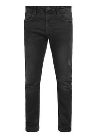 Jeans de mezclilla negra con corte ajustado, que presentan un desgaste sutil y un diseño clásico de cinco bolsillos. Textura suave y cinturilla estándar.