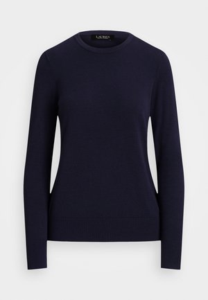 Tamsiai mėlynas megštinis su apvaliu kaklu, ilgomis rankovėmis, banguotais rankogaliais ir juosmeniu, pasižymi lygiu tekstūru ir prigludusia forma.