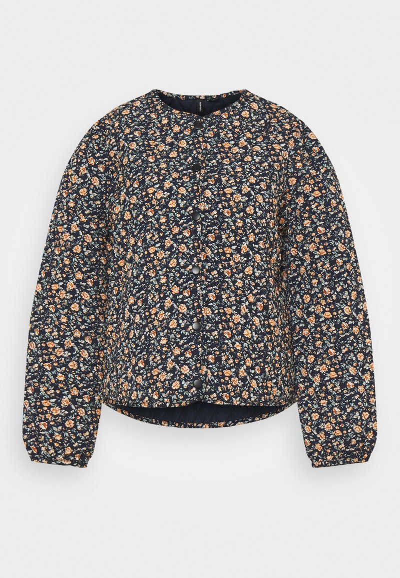 Veste matelassée bleu marine à fleurs avec encolure ronde, manches longues bouffantes et fermeture à boutons. Présente de petits motifs floraux orange et bleu sur l'ensemble.