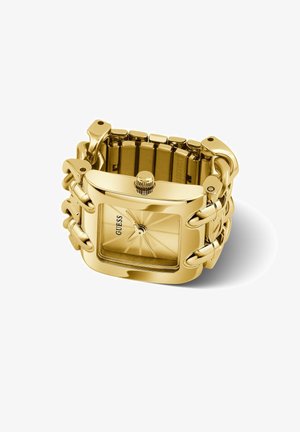Goldfarbene Guess-Armbanduhr mit breitem Gliederarmband und rechteckigem Zifferblatt, das drei Zeiger auf einem sonnenstrahlförmigen Zifferblatt zeigt.