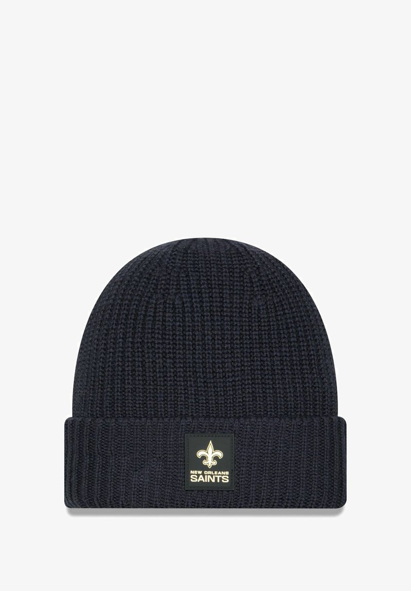 Knit beanie in dark navy with ribbed texture. Features a fold-over cuff and a square logo patch with golden accents, displaying "NEW ORLEANS SAINTS."
