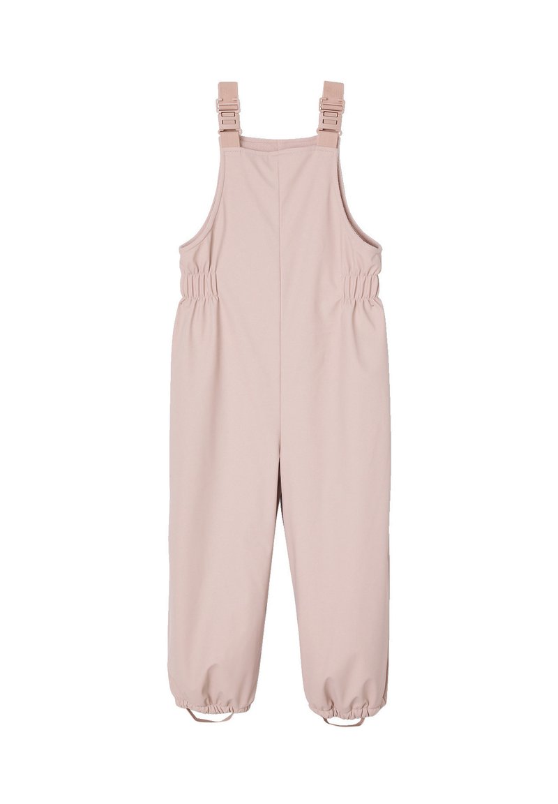 Helle rosa Latzhose mit verstellbaren Trägern, elastischem Bund und gerafften Bündchen. Hergestellt aus glattem Stoff, konzipiert für eine lockere Passform.