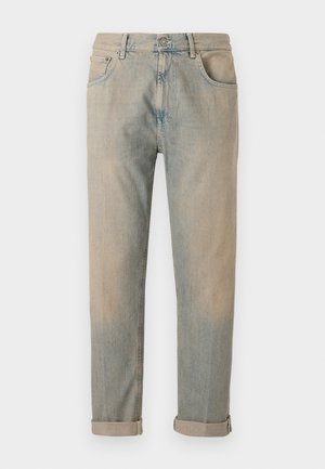 Beige denim jeans with rolled cuffs, five-pocket design, and a slight fade. Features stitching along the seams and a simple button closure.