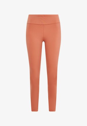 Pfirsichfarbene Leggings aus dehnbarem Stoff, mit einem hohen Taillenbund und einer glatten Oberfläche, die schmale, gerade Beine haben.