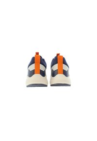 Navy sneakers with cream midsole, orange heel pull tab, and contrasting dark accents. Rounded shape with textured fabric and rubber sole.