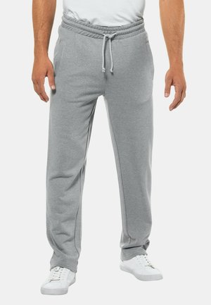 Gray sweatpants made of cotton blend fabric, featuring an elastic waistband with drawstring, side pockets, and tapered legs.
