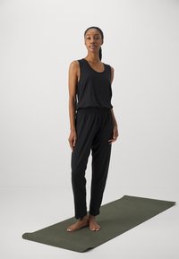 Yogasearcher - SANGHA - Haalari - deep black Pienoiskuva 1