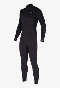 Traje de neopreno negro, con mangas largas, cuello alto y paneles texturizados en el pecho con acentos azules en el brazo.