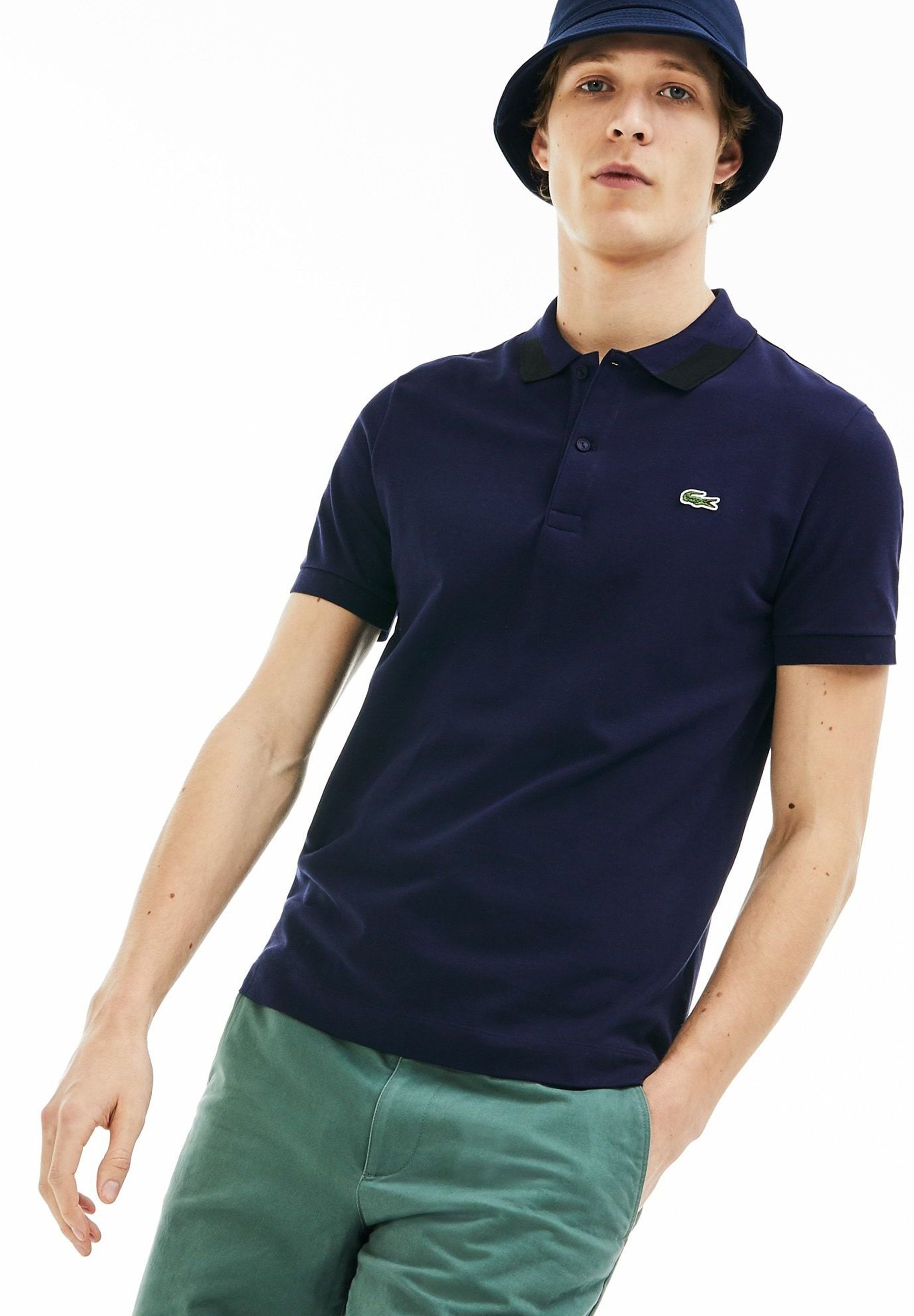 dark blue lacoste polo shirt