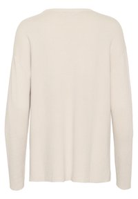 Hellbeiger übergroßer Pullover mit gerippter Struktur, rundem Ausschnitt und überschnittenen Schultern. Lange Ärmel mit lockerem Sitz und ohne Verschlüsse.