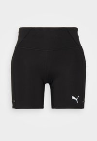 Högmidjade svarta shorts gjorda av elastisk tyg, med en kontrasterande vit logotyp på vänstra benet och platta sömmar för komfort.