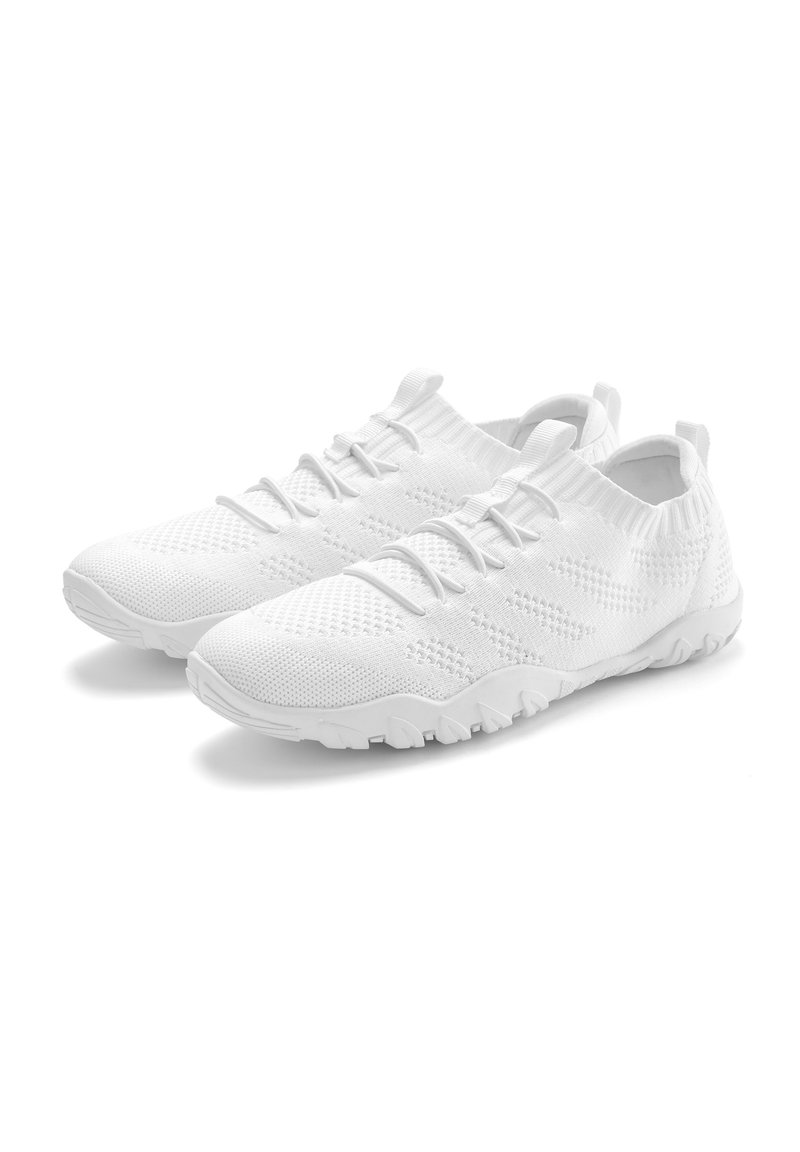 White athletic shoes with a knitted upper, flexible sole, textured surface, and elastic laces. Features a low-cut design and pull tab.
