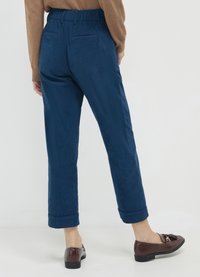 Calliope CON RISVOLTO EFFETTO  - Pantalon classique - blu