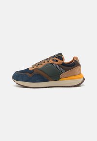 Sport sneaker with a mix of blue suede, green and brown faux leather, and a yellow midsole. Features beige laces and logo accents.