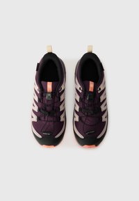 Purple mesh running shoes with black and orange accents. Featuring a streamlined design, elastic laces, and a pull tab on the heel.
