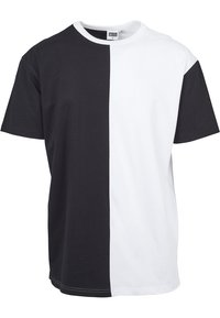 Half black, half white cotton T-shirt with a round neckline and short sleeves. Smooth texture with contrasting color blocks.