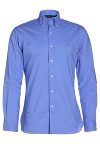 Ljusblå knapp-up skjorta i bomull, med klassisk krage och långa ärmar. Inkluderar en liten, broderad logotyp på bröstet.