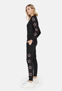 Cardio Bunny FUSCHIA - Trainingsbroek - black
