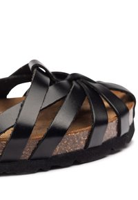 Sandalia de cuero negro con múltiples tiras entrecruzadas, plantilla de corcho, suela de goma texturizada y acabado superior liso.