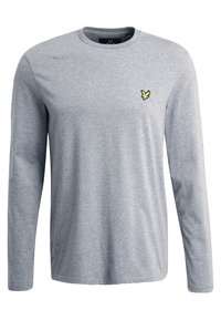 Ljusgrå långärmad t-shirt gjord av mjukt material, med rund halsringning och en liten broderad logotyp i gult på bröstet.