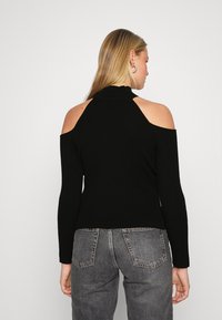 Karl Kani SMALL SIGNATURE CUTOUT TURTLE NECK - Langarmshirt - black