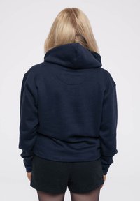 Paradiso Clothing NIRVANA INVERSE GRUNGE SMILE - Hoodie - blue