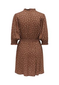 Robe marron à pois blancs, taille élastique, longues manches bouffantes avec poignets smockés et col froufroutant, vue de dos.