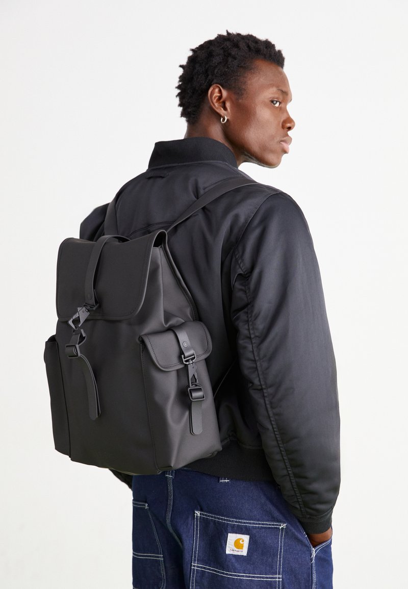 rains black utility backpack Trail Cargo - Waterproof Rolltop Laptop Daypack, 3.7 Gal this RAINS rucksack is the ideal companion Rains Rucksack Cargo Backpack -