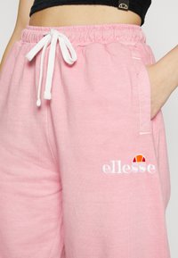 Ellesse VELAM - Calças de fato de treino - pink
