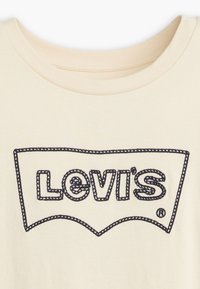 Levi's® GRAPHIC BOXY - T-shirts med print - white swan