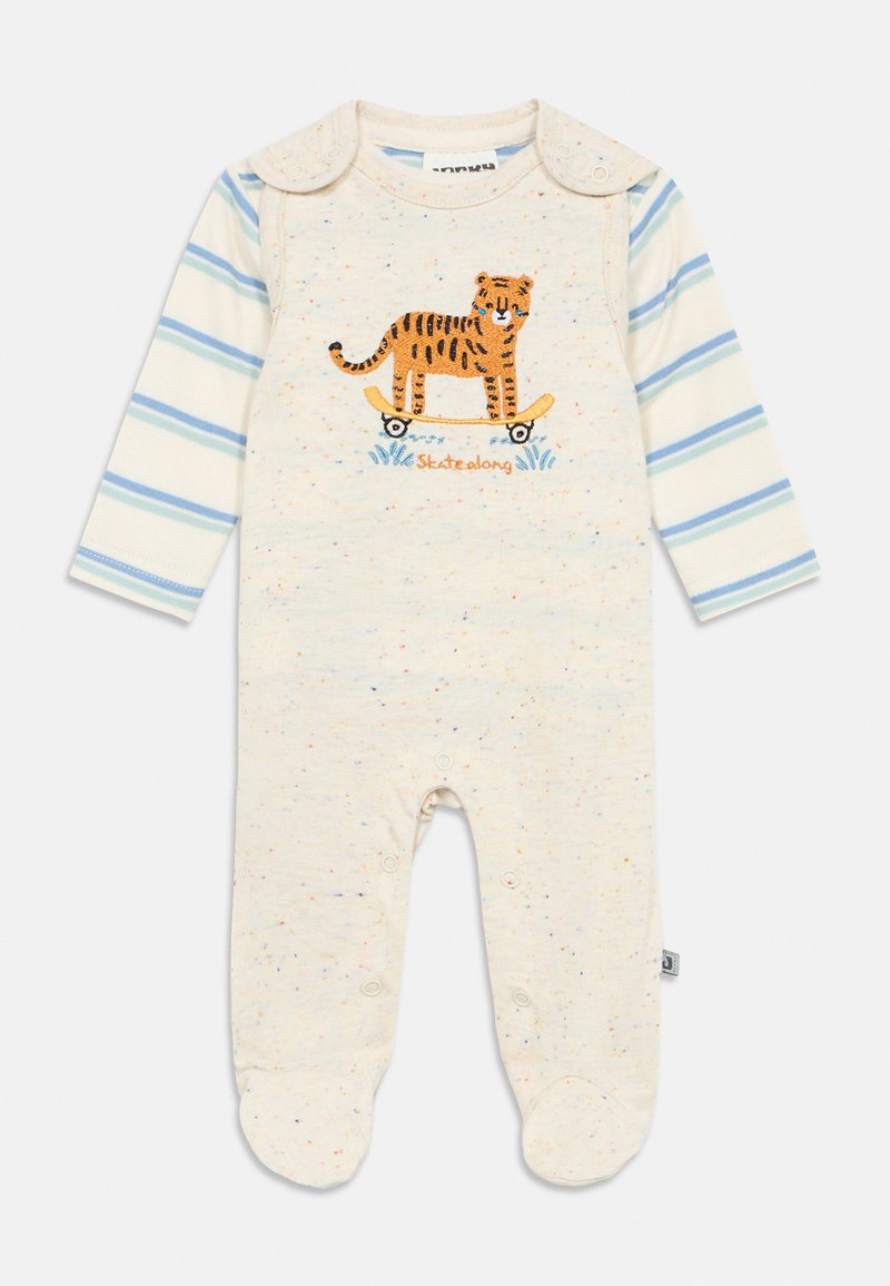 Κρεμ φορμάκι με μακριά ριγέ μανίκια. Διακοσμημένο με κεντημένη τίγρη πάνω σε σκέιτμπορντ, με το κείμενο "Skatealong" από κάτω. Κουμπιά κλιπ στον ώμο.