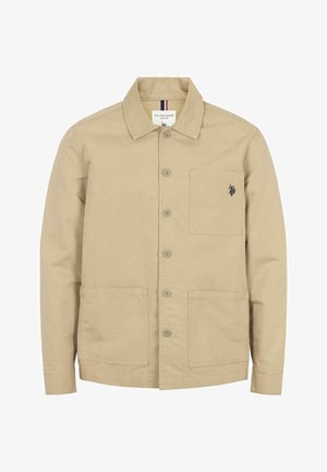 Béžová bavlnená bunda s golierom, prednými gombíkmi, dvoma veľkými prednými vreckami a malým vyšitým logom na hrudi.