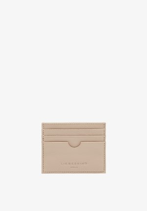 Beige leather cardholder with four card slots and a central pocket. Features embossed brand logo. Smooth texture and minimalistic design.