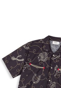 Black short-sleeve shirt featuring a colorful pattern with motifs like a Native American headdress, horseshoes, and lasso loops.