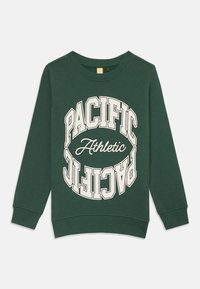 Sweatshirt long à manches vert en coton, présentant un graphique circulaire blanc avec le texte "PACIFIC Athletic" affiché en évidence.