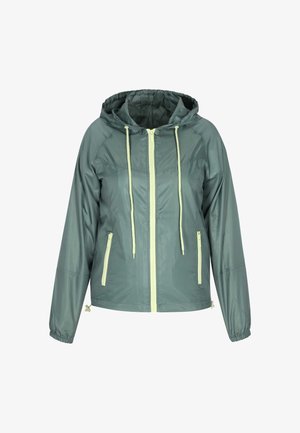 Lekka, kapturowa kurtka w stonowanym zielonym kolorze, z zamkiem błyskawicznym z przodu oraz kontrastującymi żółtymi sznurkami. Posiada dwie zasuwane kieszenie po bokach.