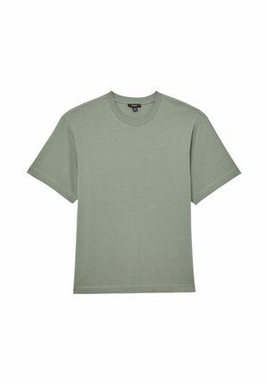 Īsām piedurknēm t-krekls no viegla, mīksta zaļa kokvilnas auduma. Tam ir apaļa apkakle un taisna piegriezuma dizains.